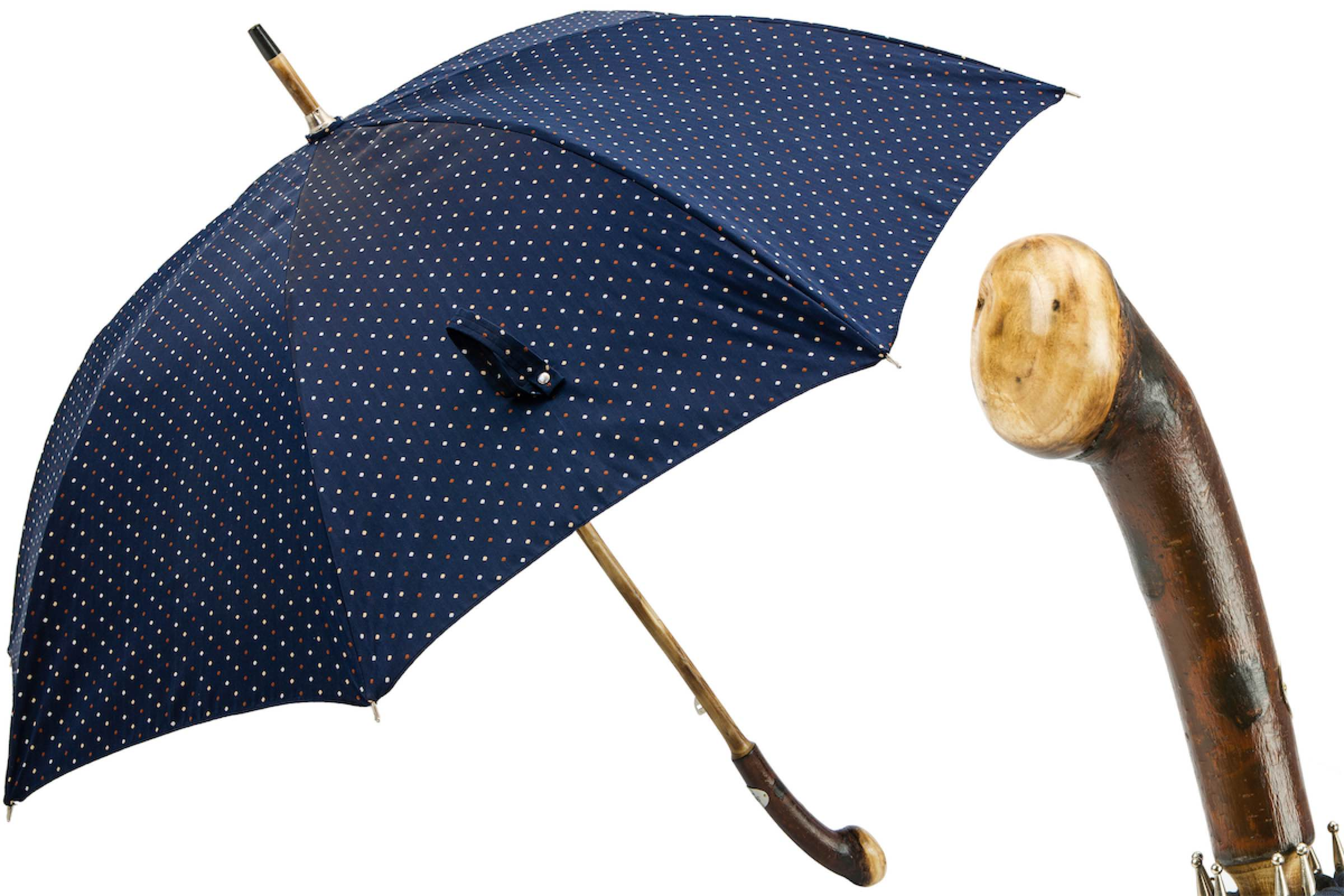 Navy blue umbrella with small white and orange polka dots and a curved wooden handle