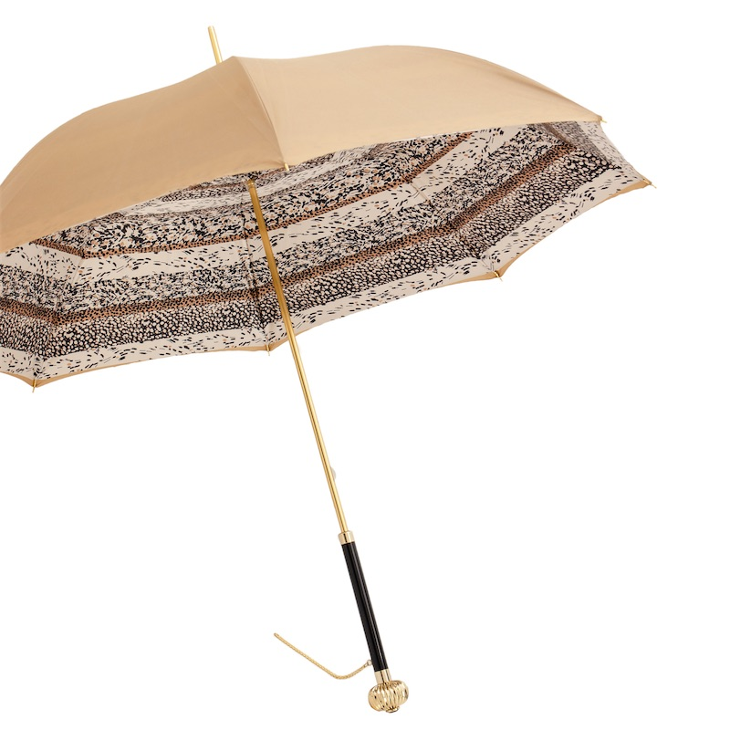 Elegant beige umbrella with patterned inner lining and gold-toned shaft and black handle