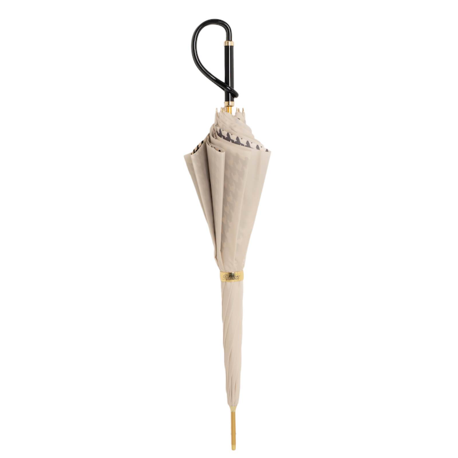 Elegant closed beige umbrella with black curved handle and gold accents featuring houndstooth pattern
