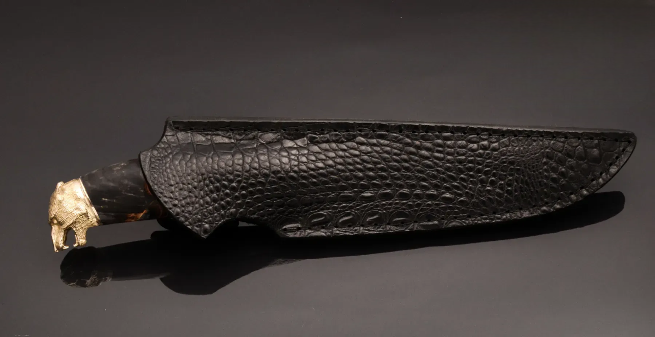Author’s Collectible Knife Wolf – Damascus Steel Blade and Unique Casting