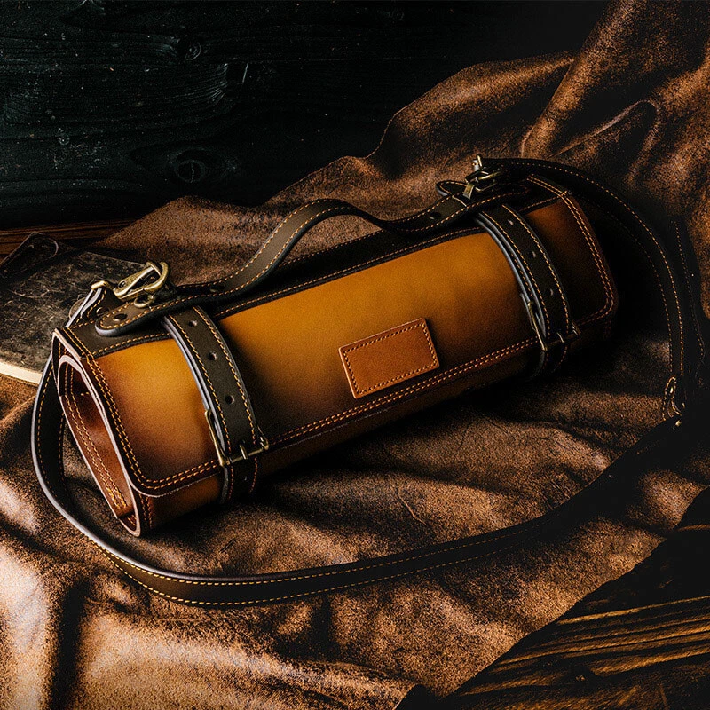 Leather knife roll with handle and straps
