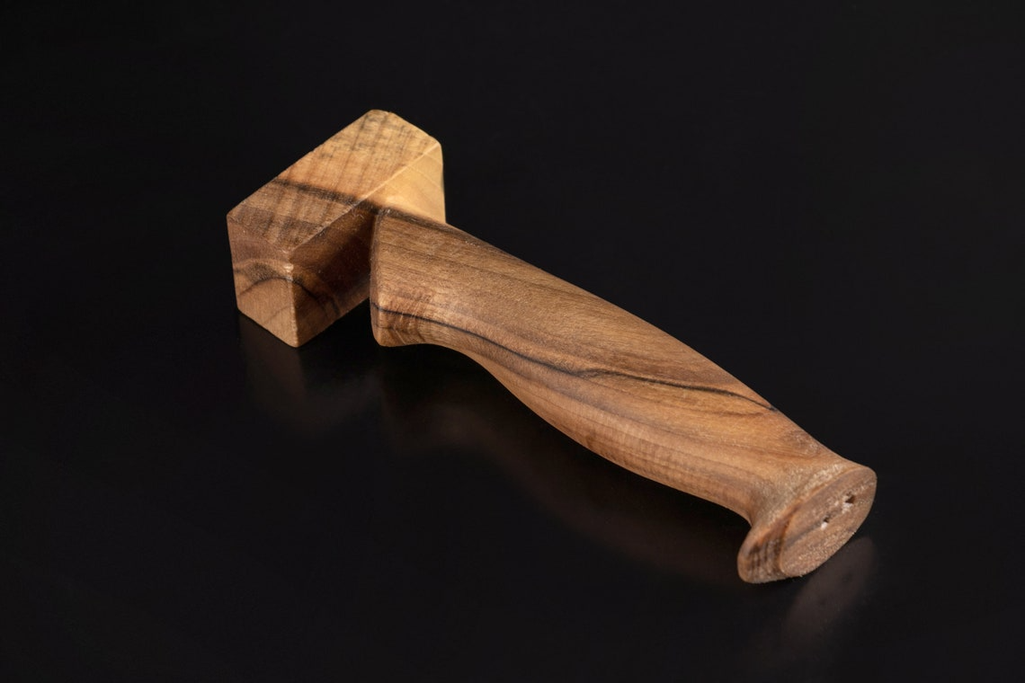 Carved wooden knife handle