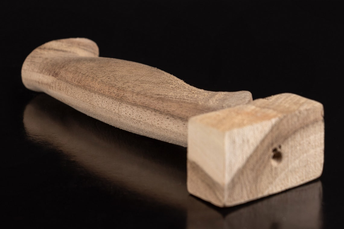 Carved wooden knife handle