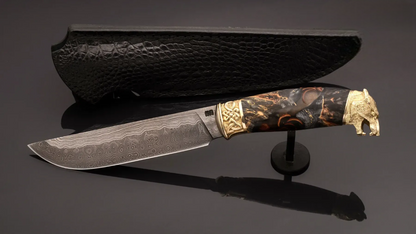 Author’s Collectible Knife Wolf – Damascus Steel Blade and Unique Casting
