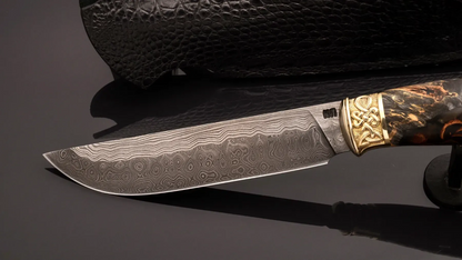 Author’s Collectible Knife Wolf – Damascus Steel Blade and Unique Casting