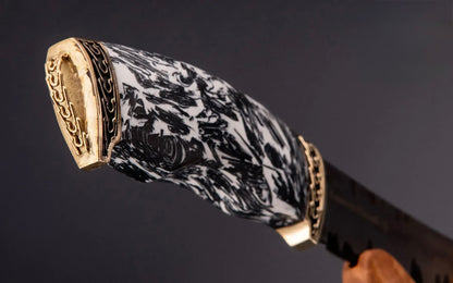 Engraved handmade knife present