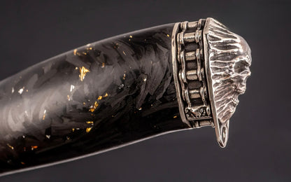 custom Damascus knife with black carbon fiber and gold accents