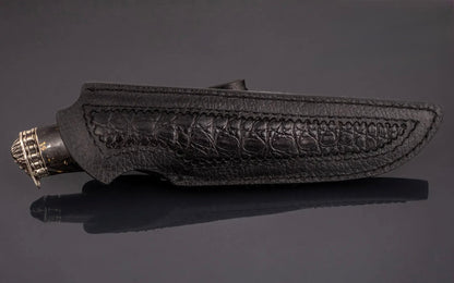 exclusive collector knife with Damascus blade and skull handle